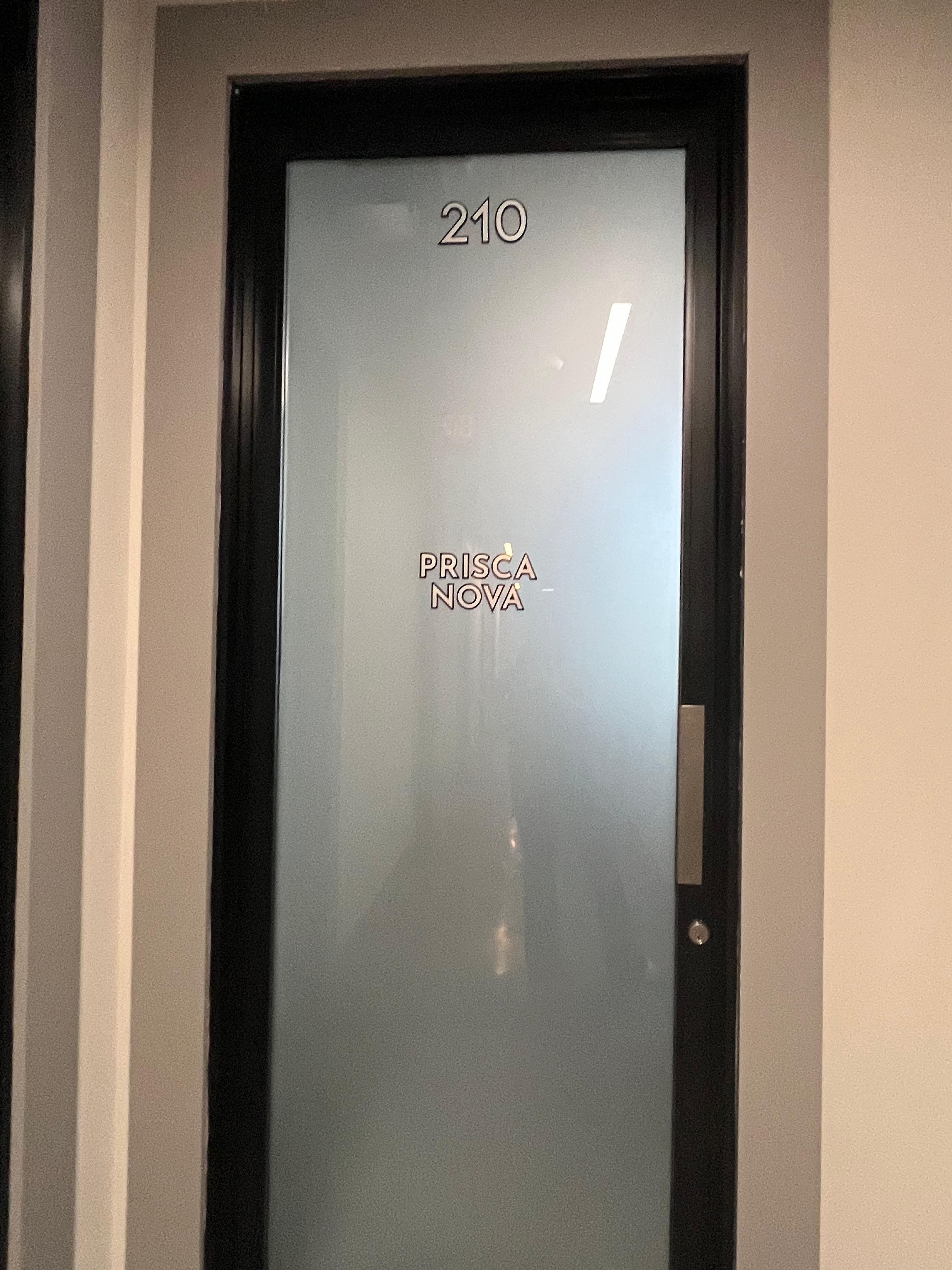 Prisca Nova suite 210 office door